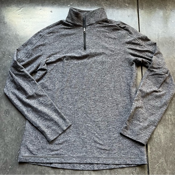 Lululemon Surge Warm 1/2 Zip *Silver
Heathered Black - Picture 2 of 12